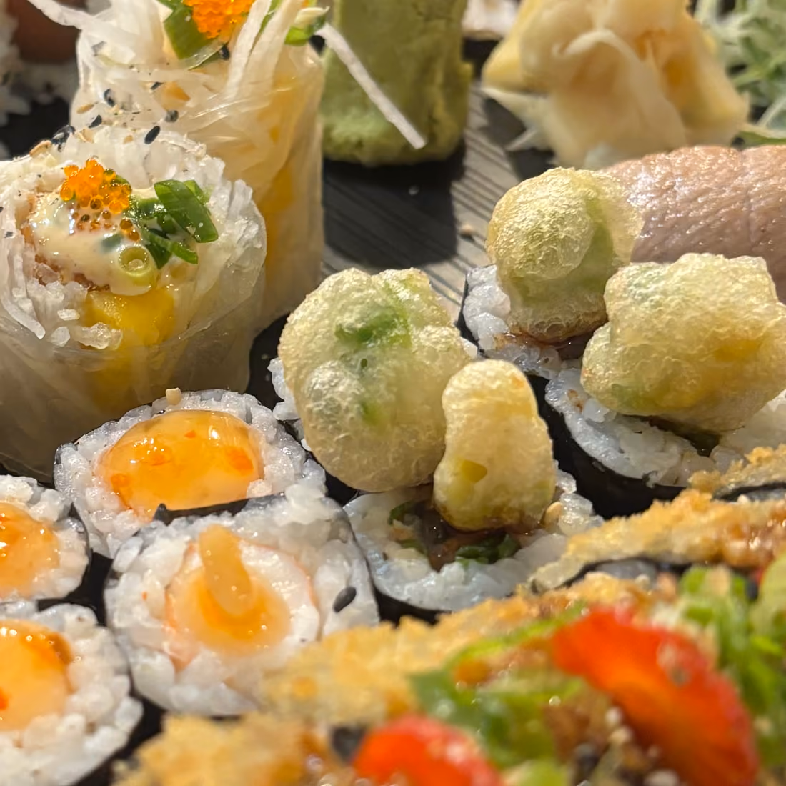 Uramaki Palma Roll with furai-style prawn and avocado, cut and plated at Hito
