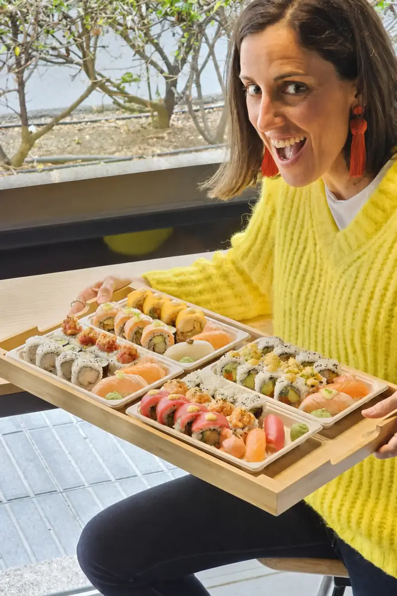 Trays of maki, uramaki and nigiri packed for delivery at Hito